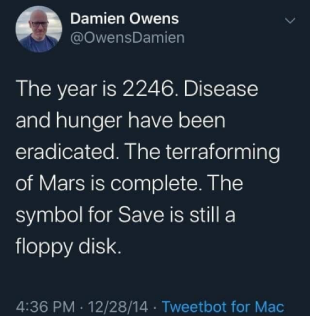 A tweet stating: The year is 2246. Disease and hunger have been eradicated. The terraforming of Mars is complete. The symbol for Save is still a floppy disk