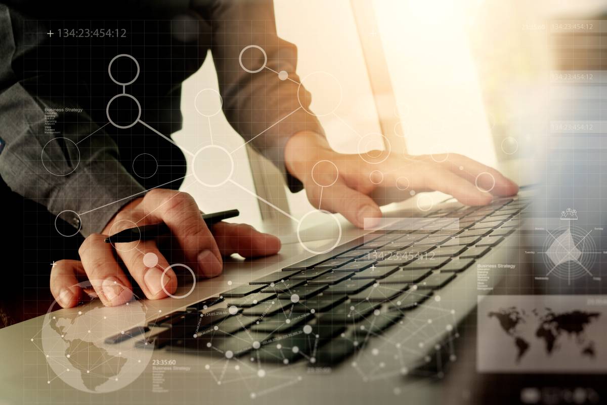 A businessman typing on a keyboard