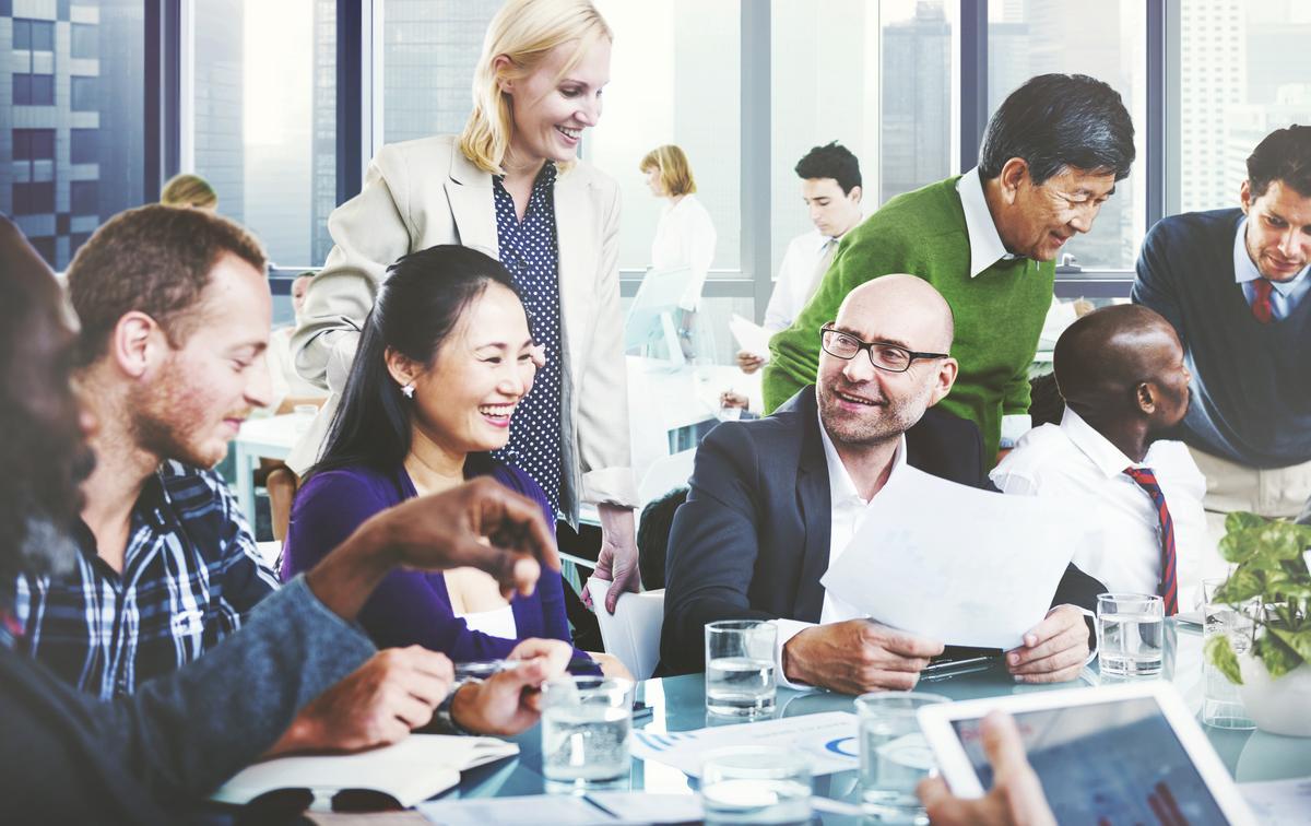 Happy business people having a meeting