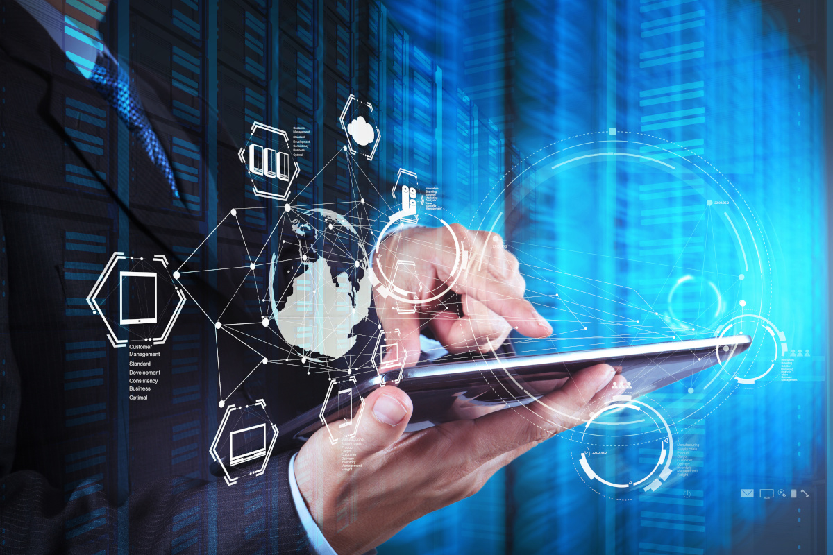 Man using tablet with security icons floating around