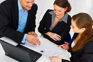 business professionals sitting at table