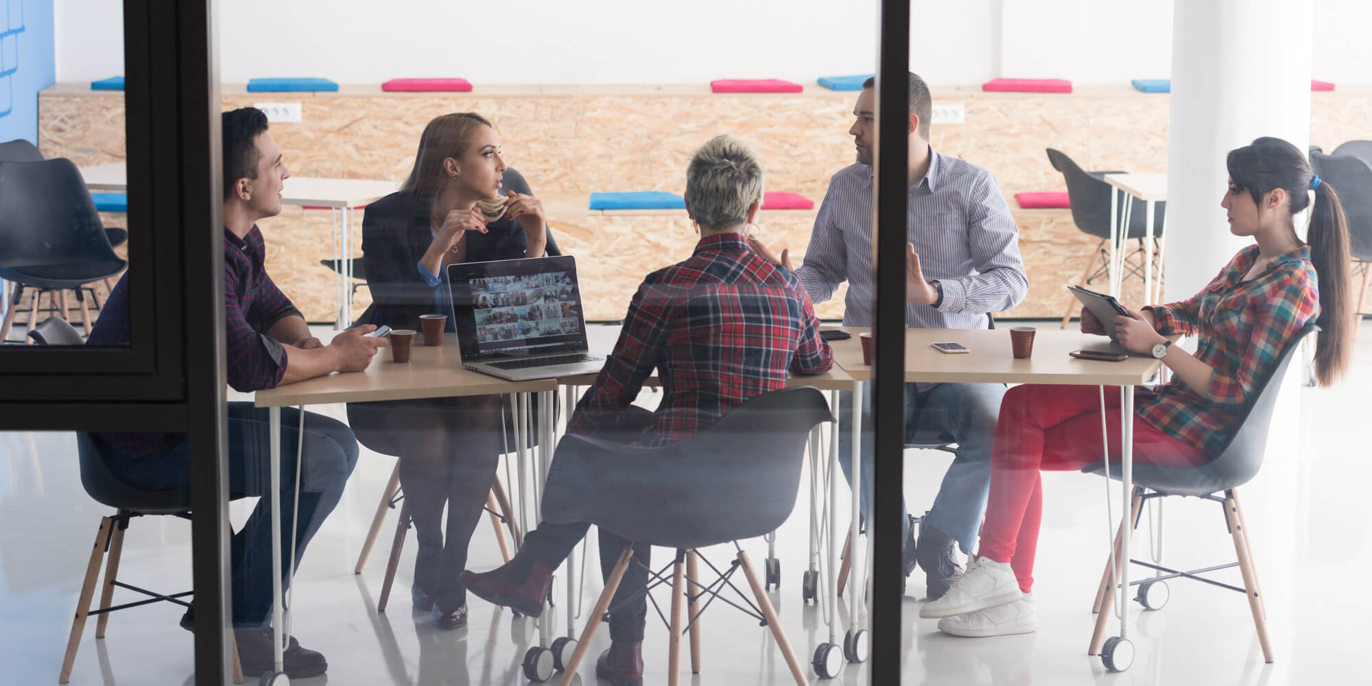 Group of young businesspeople having a meeting