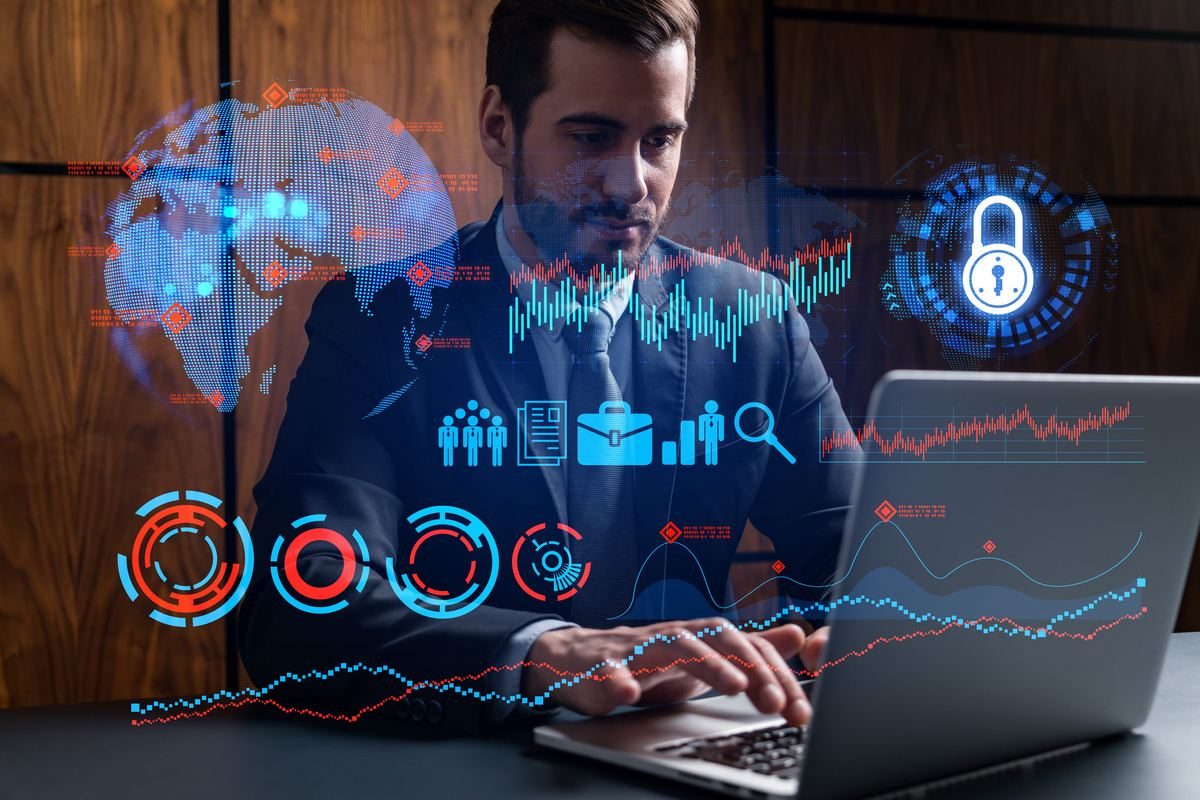 Businessman at a laptop surrounded by financial charts and a padlock icon.