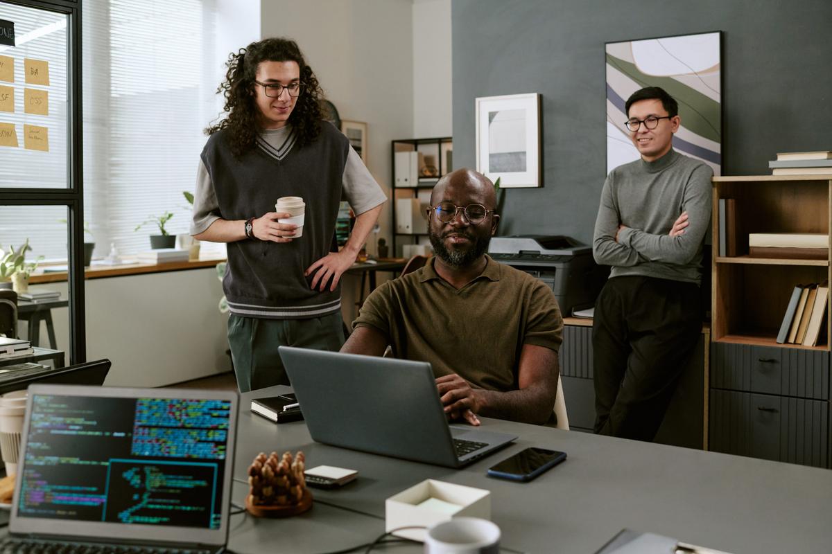 Happy and busy development team in an office.