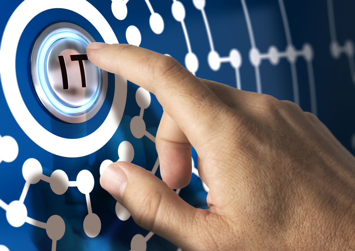 Man pressing digital IT button